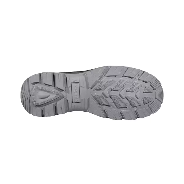 Vista inferior de una suela de zapato gris con un dibujo intrincado y el logotipo de la marca incrustado en el centro, resaltando su diseño para mayor agarre y durabilidad.