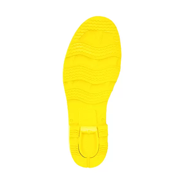 Una suela de zapato de color amarillo brillante con patrones texturizados y una cala central distintiva para pedales de bicicleta automáticos. la superficie presenta crestas onduladas para mayor tracción.