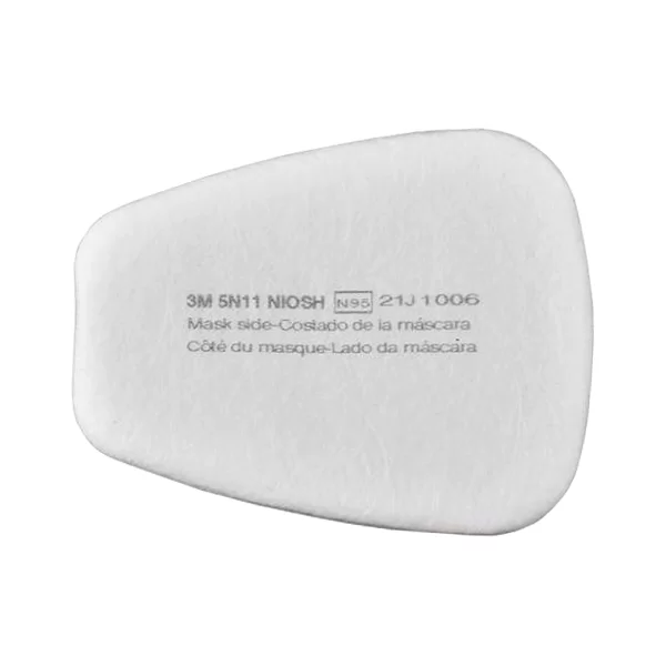 Almohadilla de mascarilla con filtro de color blanco 3m 511 niosh n95 2j1 1006 con texto identificativo impreso que indica el lado de la mascarilla en inglés y español. la almohadilla tiene un ángulo y una superficie ligeramente texturizada.