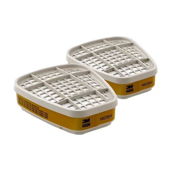 Dos cartuchos de vapor multigas 3m 6006. Los cartuchos son ovalados, con cara de rejilla y de color beige, etiquetados con “niosh” en texto negro sobre una banda amarilla alrededor de la base.
