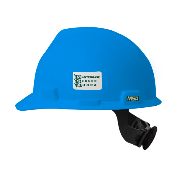 Un casco de seguridad azul brillante con una correa ajustable negra. El casco presenta un logo blanco con el texto "msa" y la frase en español "manténgase seguro ahora" en el frente.