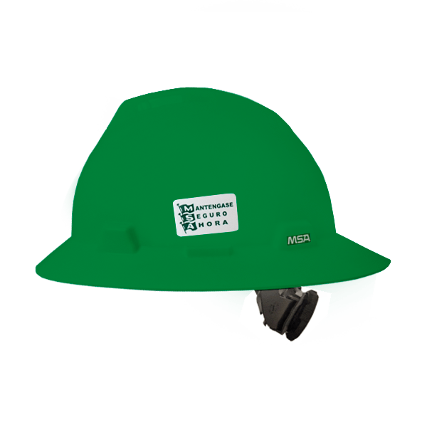 Un casco de seguridad de color verde vibrante con una pegatina blanca con la etiqueta "mantengase seguro ahora" encima del logotipo de msa en el frente. el casco presenta una correa negra ajustable para la barbilla, representada sobre un fondo liso.